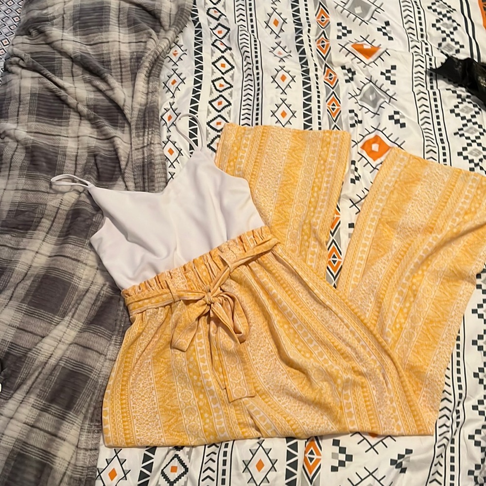 white and yellow jumpsuit.